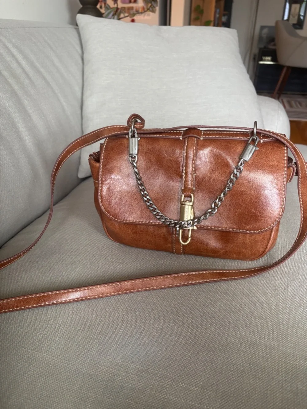 CHARLES & KEITH Delfina Chain Crossbody Bag in Distressed Tan